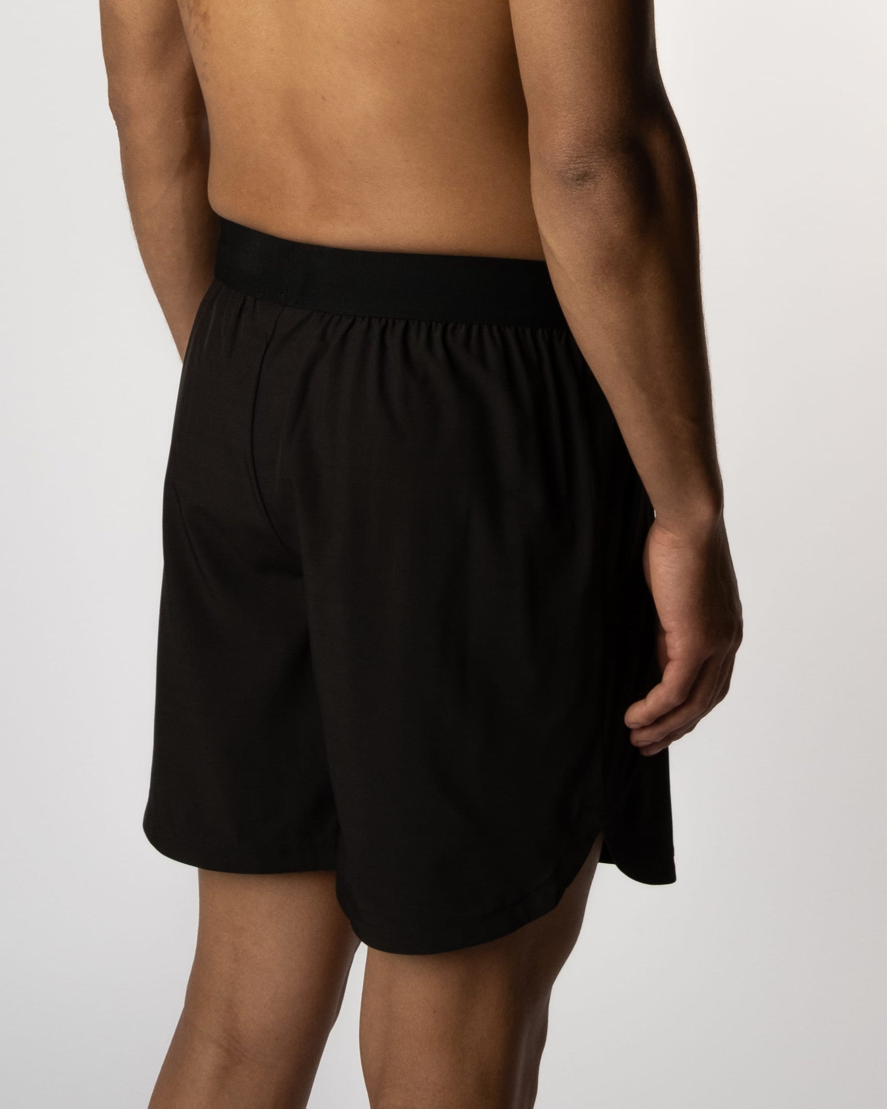 Close-up van de achterzijde van Onyx Manga shorts van Gym Junkie, met focus op details en kwaliteit voor heren - Heren Gym Shorts
